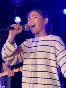 Jasmine singing at The Brass Monkey